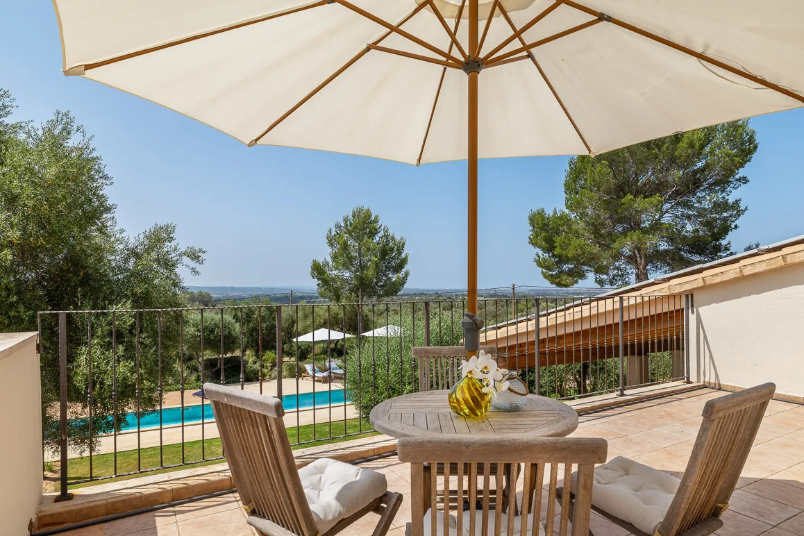 Terrace view over the pool and countryside